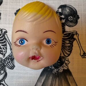 Vintage Doll Head with Blue Eyes